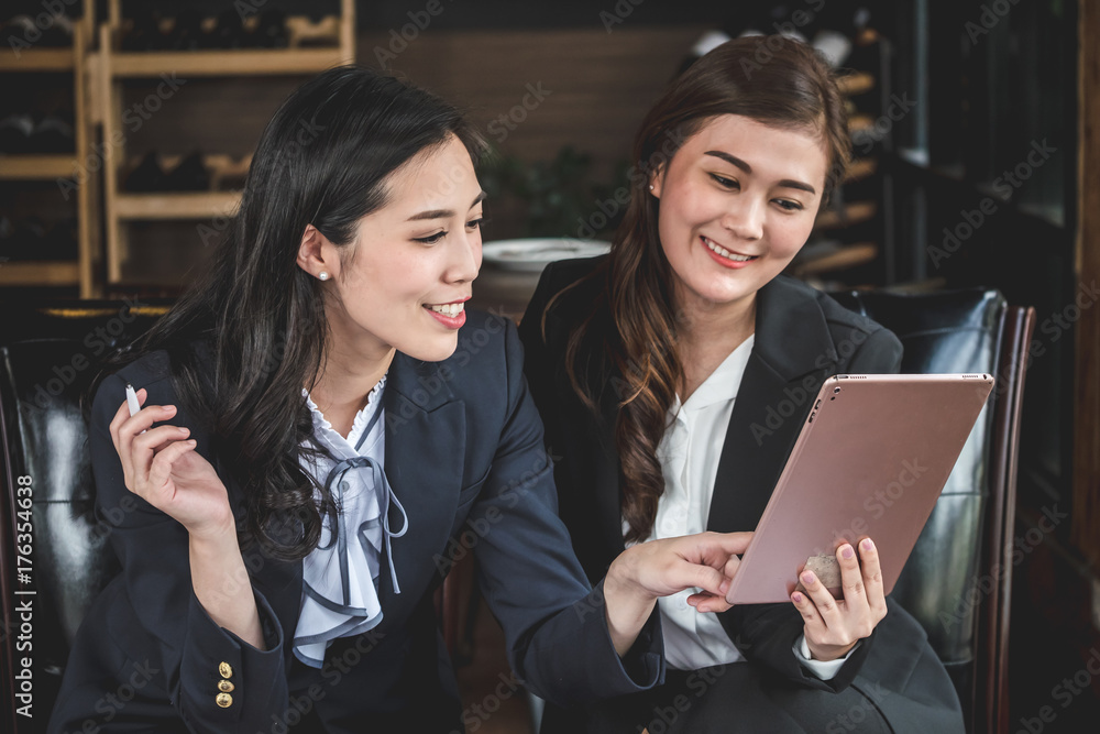 © ronnarong - Asia business women discussing and meeting together in the office. © ronnarong - Asia business women discussing and meeting together in the office.