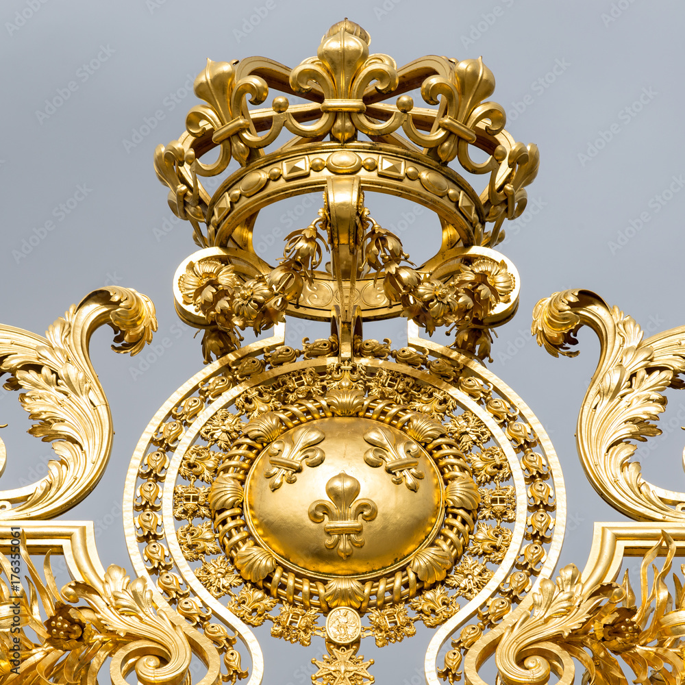 The golden gate of the Palace of Versailles, or Chateau de Versailles, or simply Versailles, in France