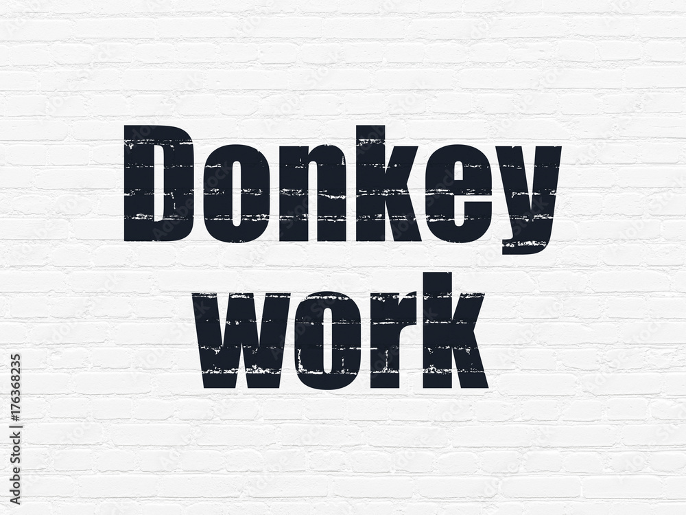 Finance concept: Donkey Work on wall background Finance concept: Donkey Work on wall background