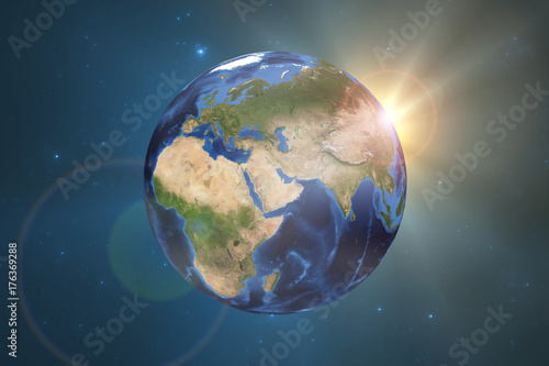 Planet Earth with starry galactical background and rising sun. Elements of this image furnished by NASA