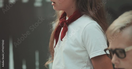 Close up of a girl talking in the office. Children. Modern toys. Kid, little, office, professional, suit, teamBusiness company. Shot on RED Epic Camera. photo