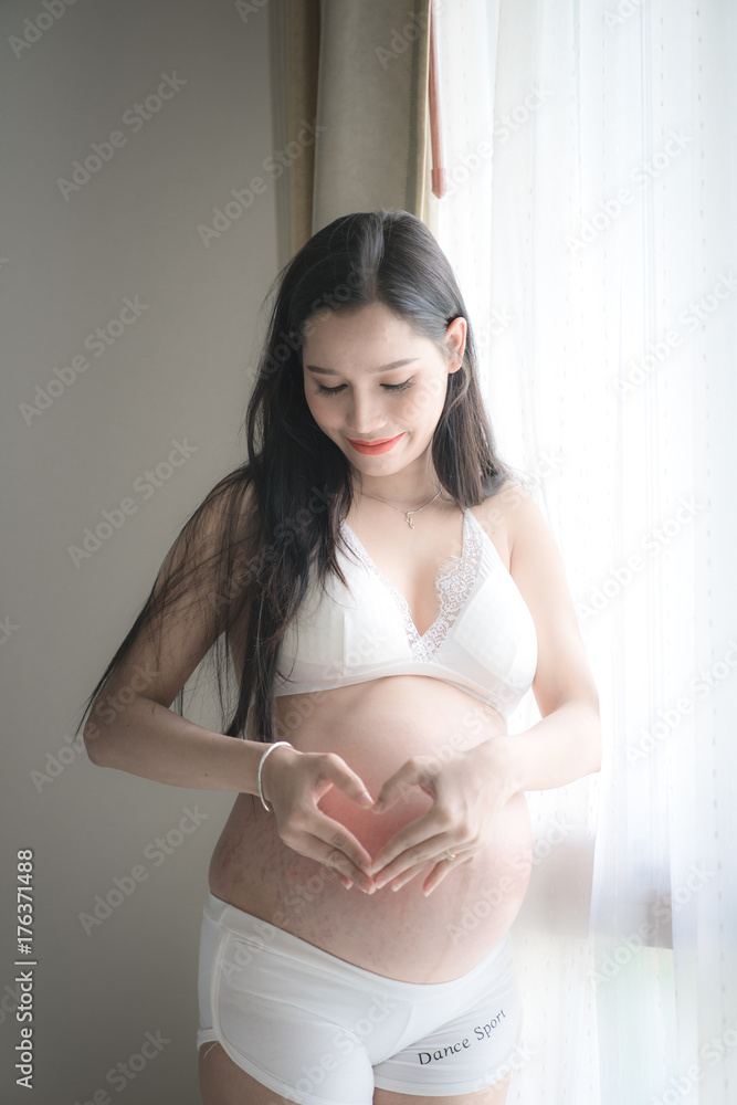Pregnant young woman in happy time waiting for the gift of life wil coming soon Pregnant young woman in happy time waiting for the gift of life wil coming soon