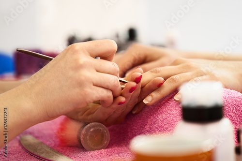 Cuticle Remover. Manicure Treatment. Close up.