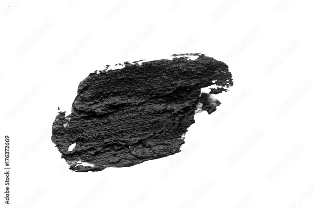 Black volcanic cosmetic clay texture close up. solution of cosmetic clay abstract background.