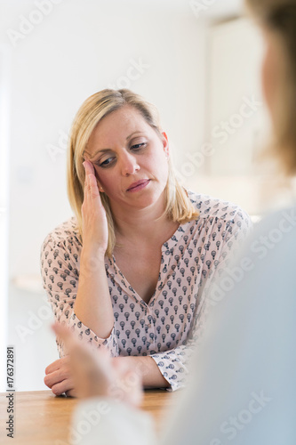 Fototapeta Naklejka Na Ścianę i Meble -  Mature Woman Discussing Problems With Counselor