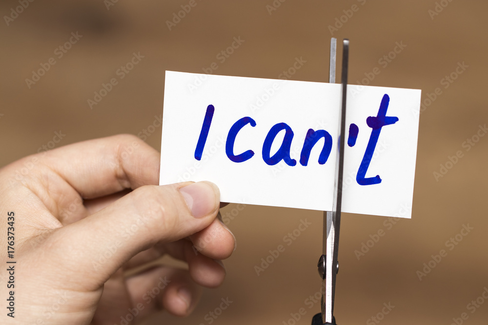 I can self motivation - cutting the letter t of the written word I can't so it says I can I can self motivation - cutting the letter t of the written word I can't so it says I can