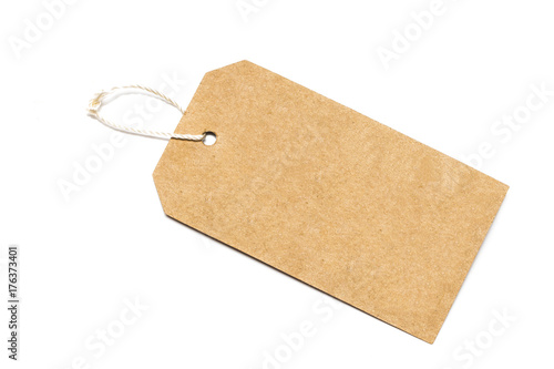 Blank tag tied with string .Paper label.Blank brown cardboard price tag or label with thread isolated
