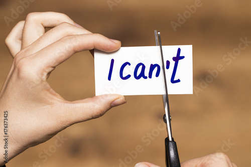 I can self motivation - cutting the letter t of the written word I can't so it says I can photo
