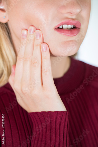 Studio Close Up Of Woman Suffering With Toothache