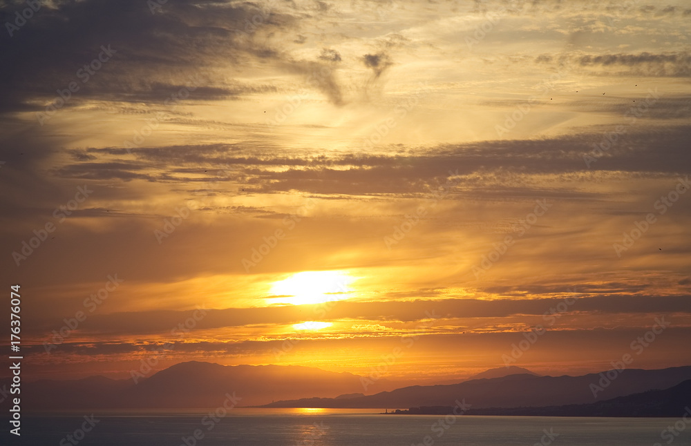 A sunset on the sea. La Herradura, Almunecar, Granada province, Andalusia, Spain.