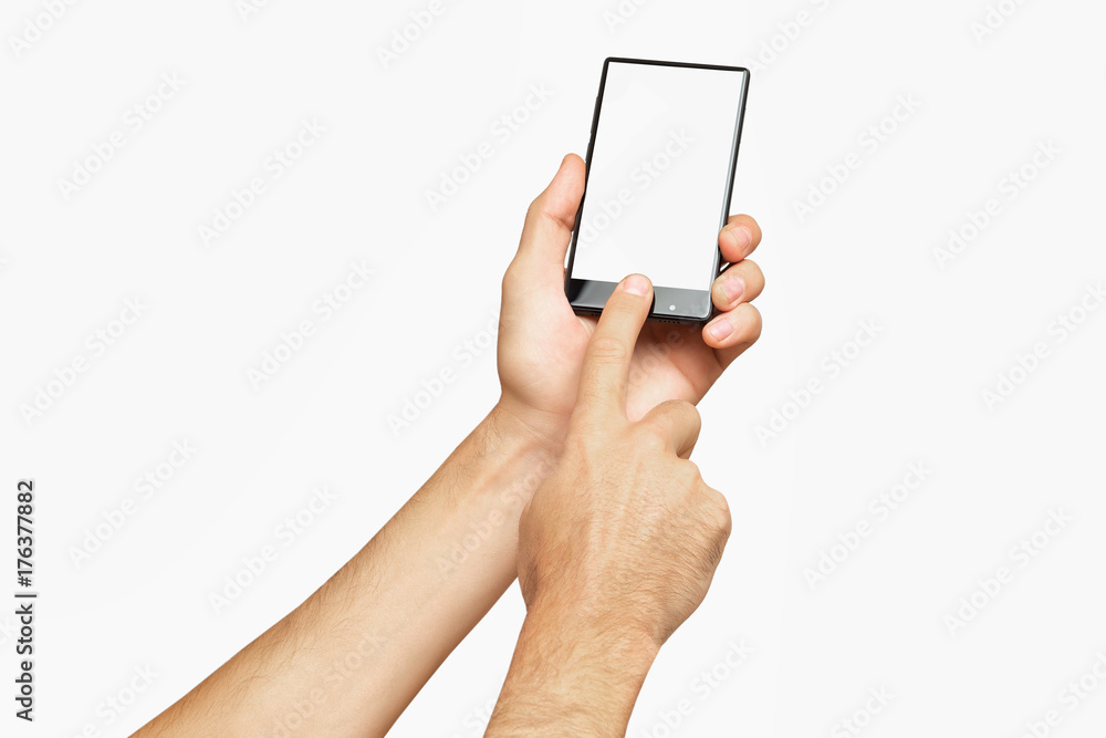 Mockup of male hand holding black cellphone isolated at white background.