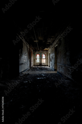 Collapsing Hallway with Stained Glass Windows - Abandoned Hudson River State Hospital - New York