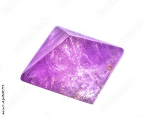 Obraz na płótnie The semi-precious stone Amethyst, polished, on a white background. w salonie