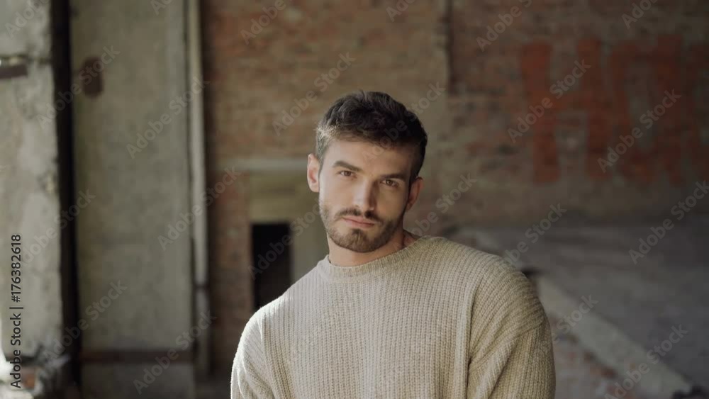 Stylish male model looks at camera in the catacombs 4K Stylish male model looks at camera in the catacombs 4K