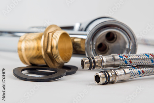 mixer,bronze coupling, tap flexible hoses to faucets,  rubber gasket, close-up