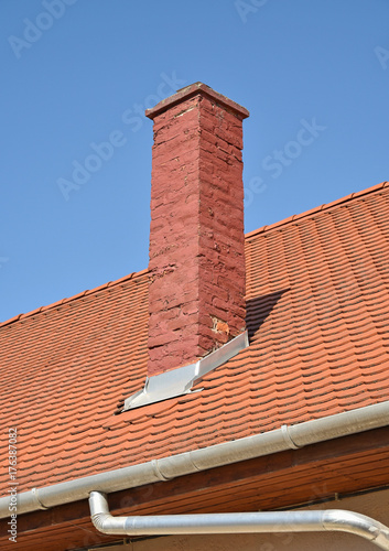 Roof of a house with smoke stack