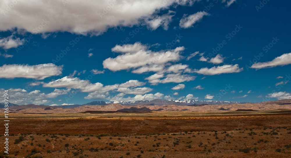 Moroccan panorama with typical colors, scenery , blue sky and snowy mountains #1