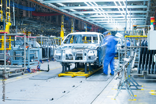 car production line, workers are working. photo