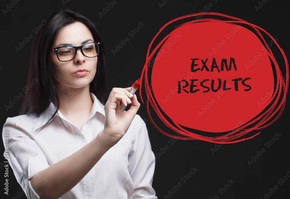 The concept of marketing, technology, the Internet and the network. A young businessman shows what is important for business: Exam results The concept of marketing, technology, the Internet and the network. A young businessman shows what is important for business: Exam results