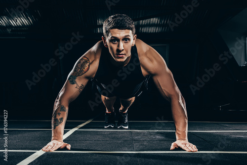 sportsman doing push ups