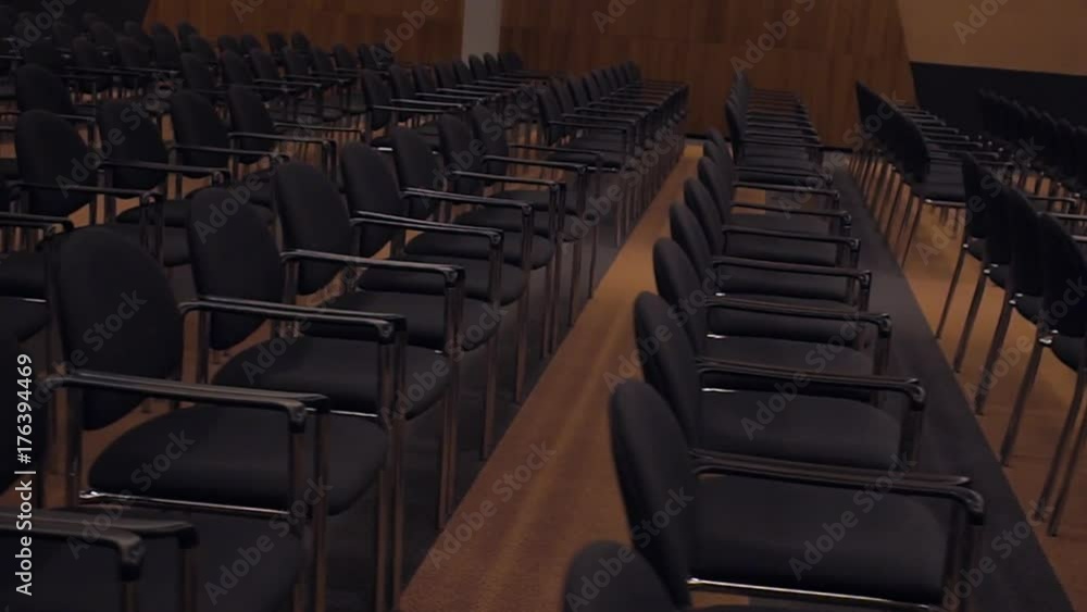 Empty hall full of seats ready for presentation Empty hall full of seats ready for presentation