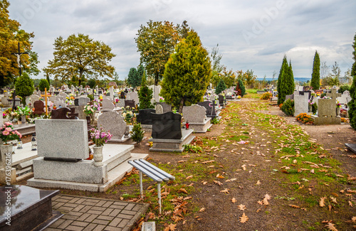Graves on catholic cemetery. All Saints Day / All Hallows / 1st November.