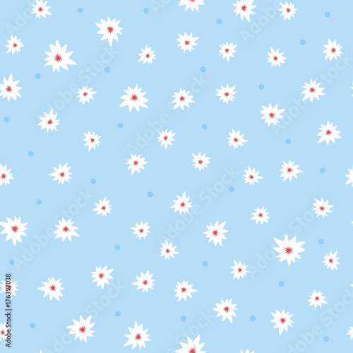 Cute floral seamless pattern. Small white flowers on blue background with round dots.