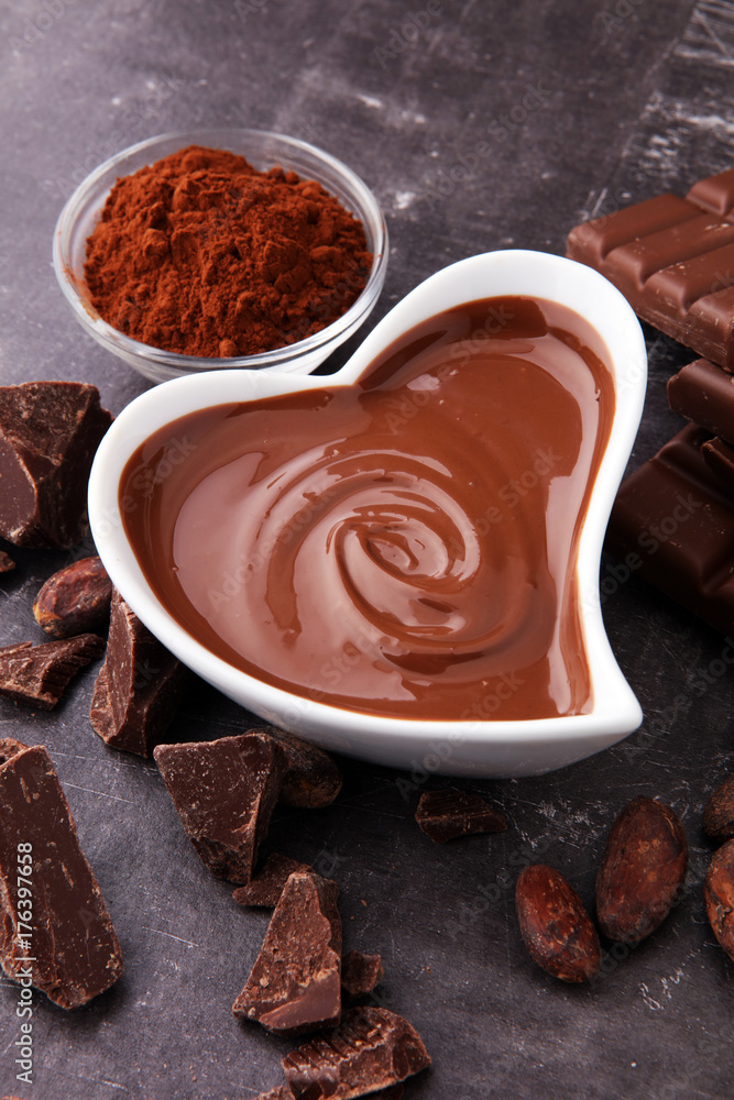 Melting chocolate or melted chocolate and chocolate swirl. stack and powder. Melting chocolate or melted chocolate and chocolate swirl. stack and powder.