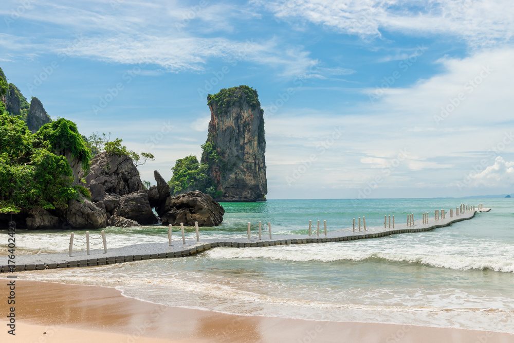 empty pontoon bridge and a view of the rocks in the resort of Thailand