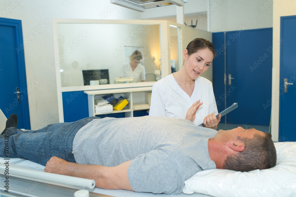 doctor is talking with her patient about test results