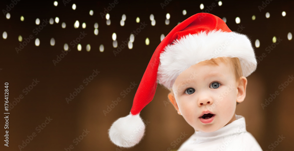little baby boy in santa hat at christmas little baby boy in santa hat at christmas