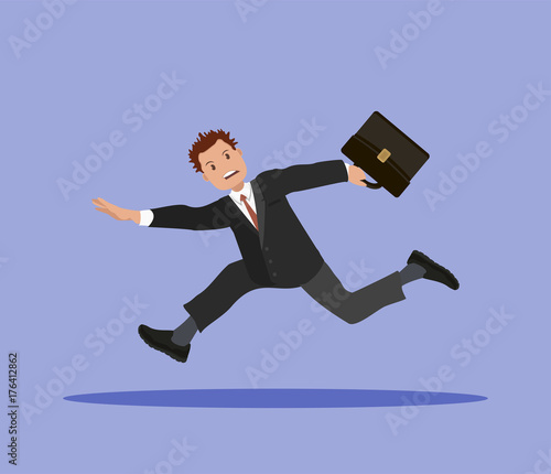 A businessman with a briefcase in his hand is late for work.