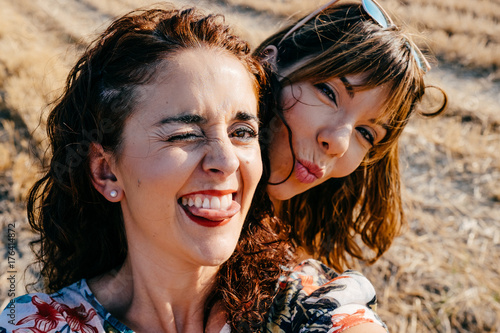 Photography .Young and carefree women doing sightseeing in the countryside, in a division ar