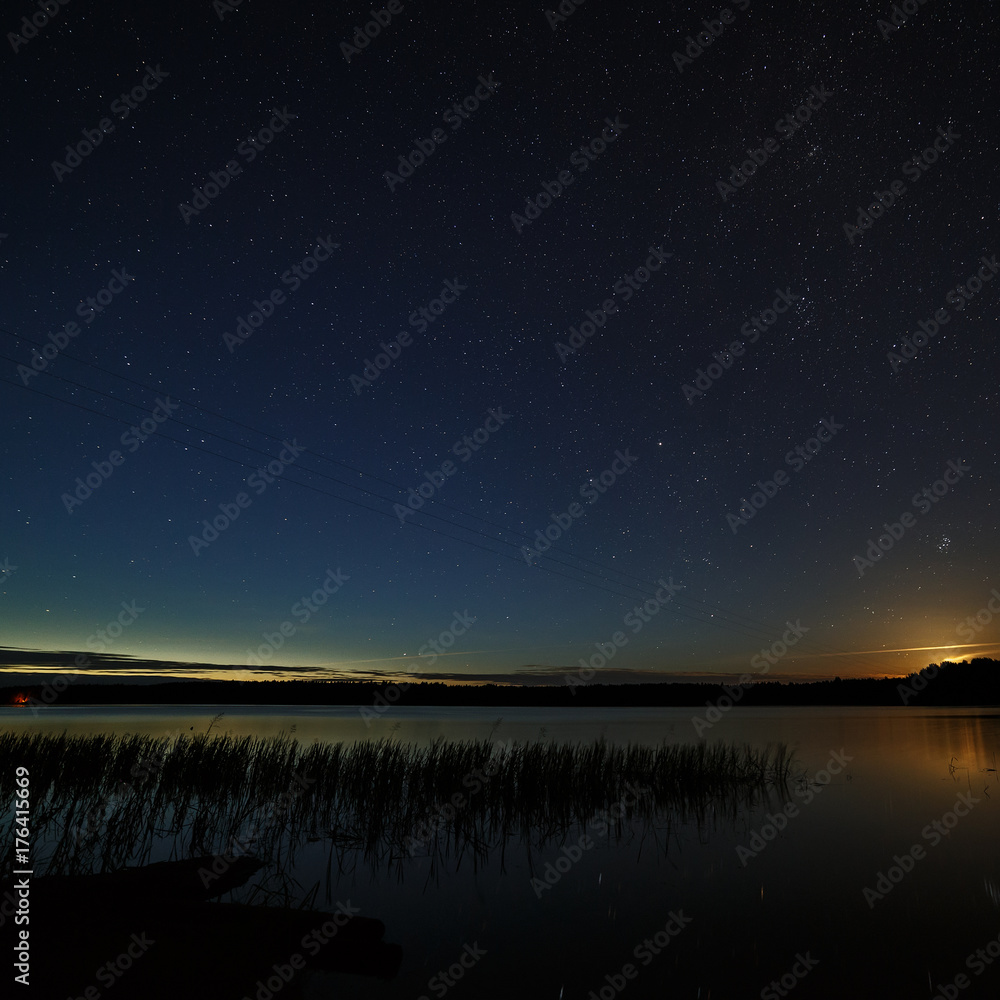 The stars in the night sky over the river. The stars in the night sky over the river.