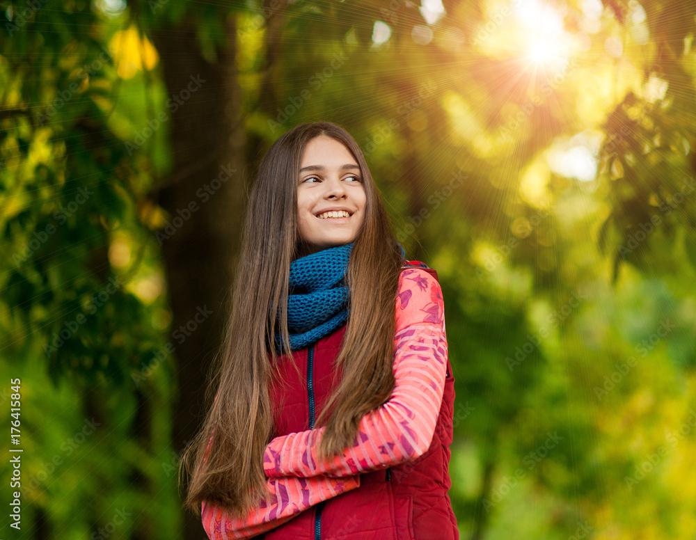 Portrait of pretty girl on the background yellow leaves Portrait of pretty girl on the background yellow leaves