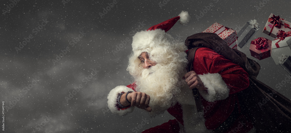 Santa Claus running and delivering gifts Santa Claus running and delivering gifts