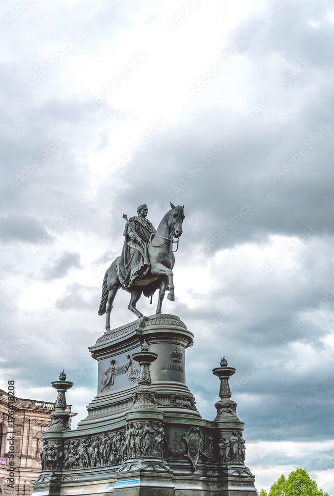 Dresden, the ancient capital of Saxony. Monument to King Johann Saxon against the backdrop of a gloomy cloudy sky