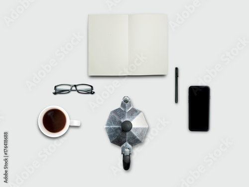 Look up view, Flat lay style, Working desk with working equipment coffee and moka pot epresso machine. isolated on pastel background with Clipping path. photo