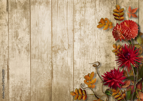 Autumn bouquet with dahlias on vintage wooden background
