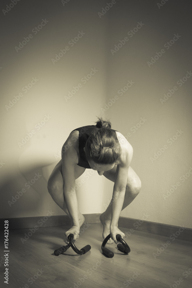 Naklejka premium Woman starting exercise for yoga