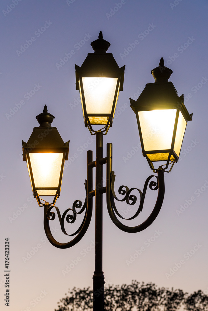 glowing stylish lantern in the street