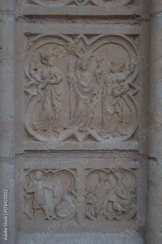Carving of religious scene in stone of a church