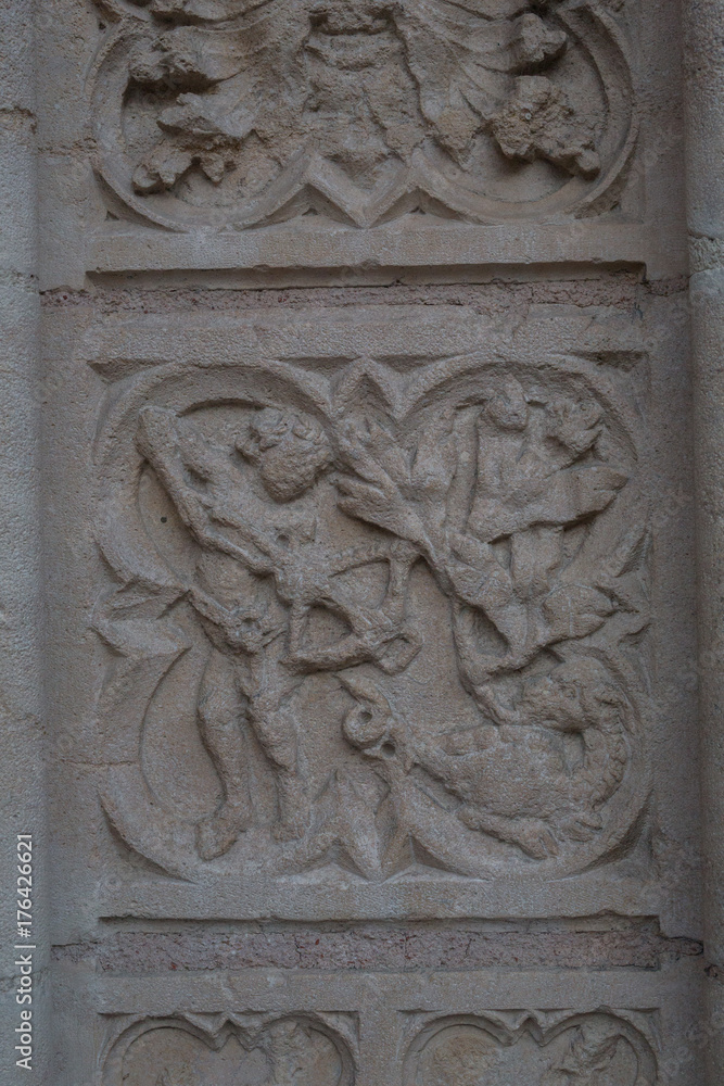 Carving of religious scene in stone of a church