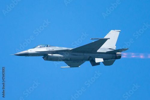 F-16 Fighting Falcon flying away  with afterburner on 