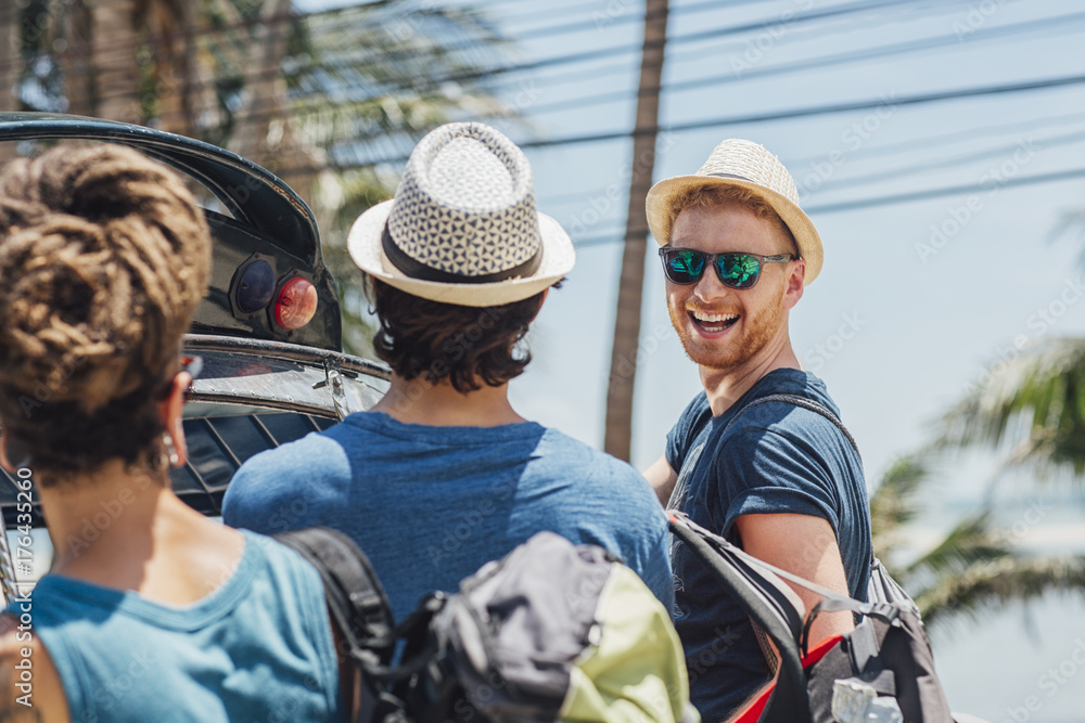 Tourists Enjoying a Taxi Ride in a Tropical Country Tourists Enjoying a Taxi Ride in a Tropical Country