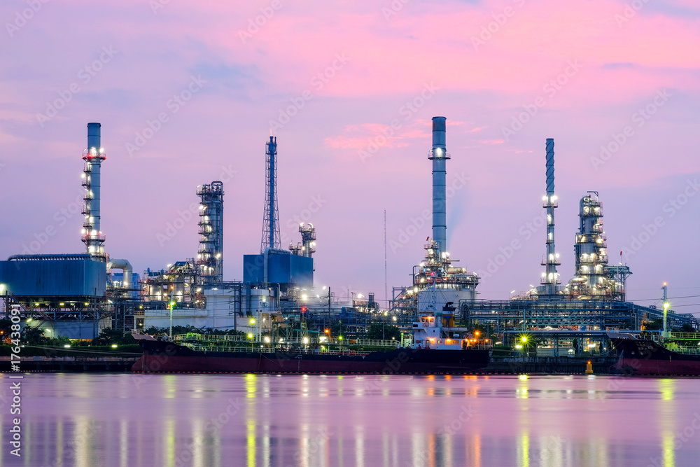 View of industry Oil Refinery working in sunrise sky, On the opposite side of the Chao Phraya River, Bangkok, Thailand.