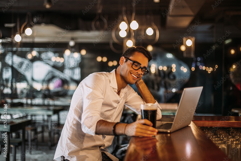 Stylish man working in a restaurant. Stylish man working in a restaurant.
