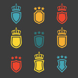 Shields set. Collection of different shield shapes with crown and stars. Heraldic royal design in flat style. Vector illustration.