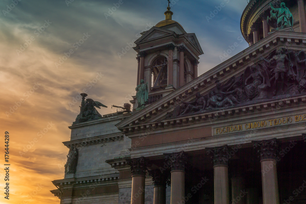 Facade of church against a dramatic sky at dawn