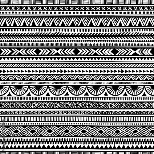 Seamless ethnic pattern. Handmade. Horizontal stripes. Black and white print for your textiles.